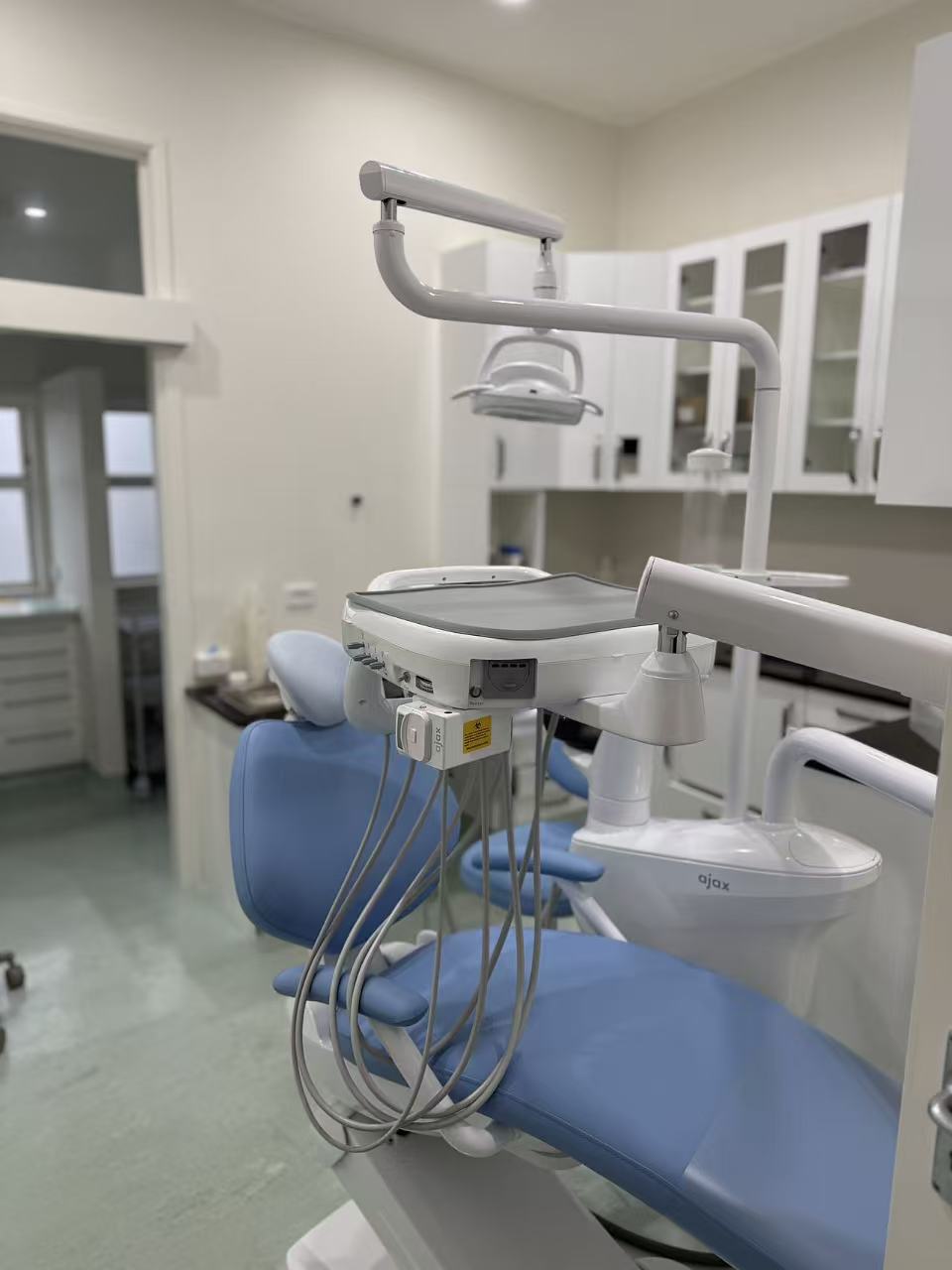 Smile Care Auckland dental chair and equipment in a treatment room